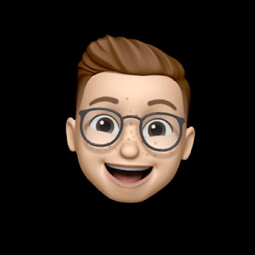 Serhii Shramko's Memoji avatar — smiling face with brown hair and round glasses