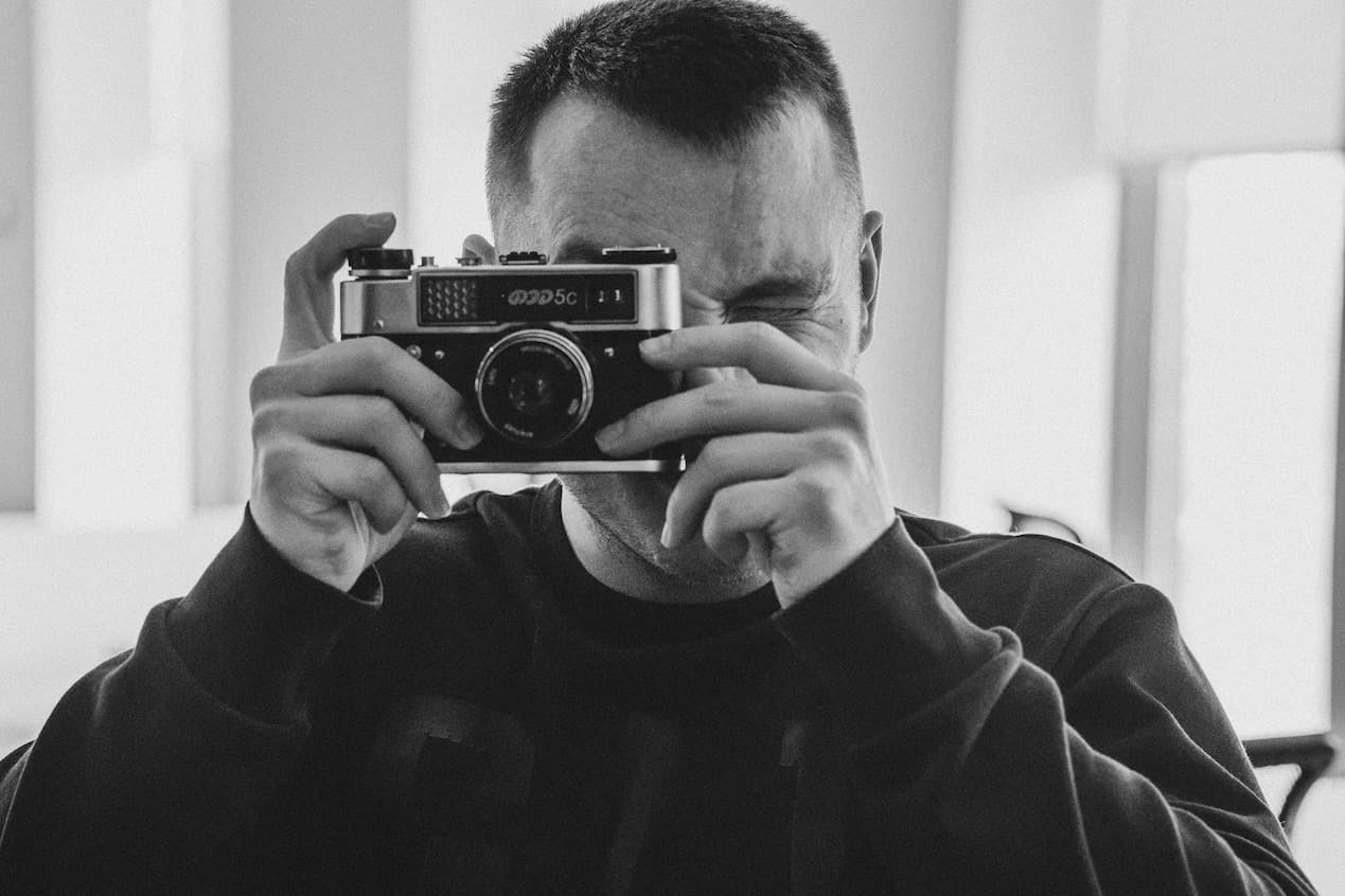 Serhii Shramko with photography camera